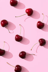 Cherries on pink background Poster och Canvastavla